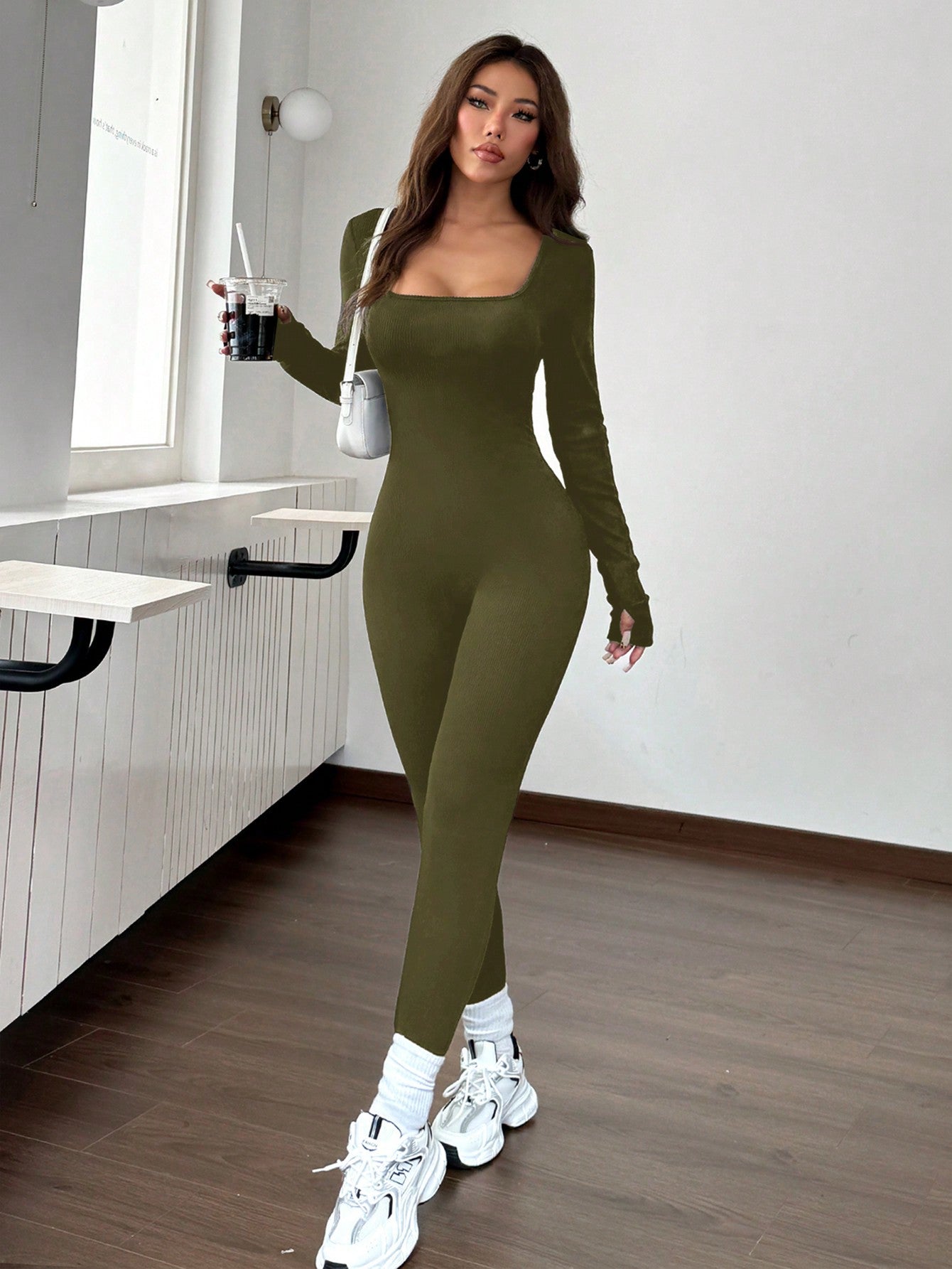 "ThermaFlex™ Sculpting Jumpsuit – Warmth Meets Curves"